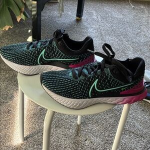Nike Women’s Flyknit Running Shoes in Black, Mint & Pink